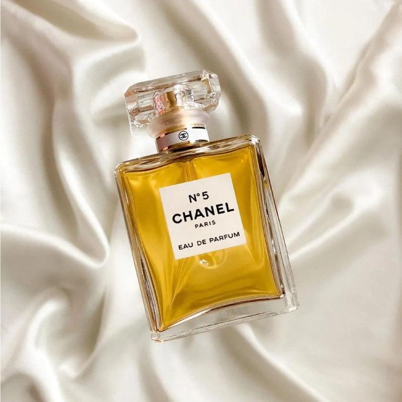 Chanel No. women's perfume bottle. 5 on a white background, the embodiment of classic elegance